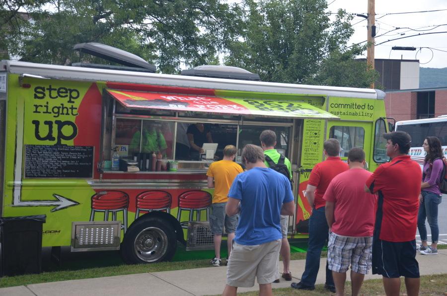 Students line up to purchase food from the What the Fork Truck. What the Fork eagerly returns this year to once again provide unique menu options on campus.