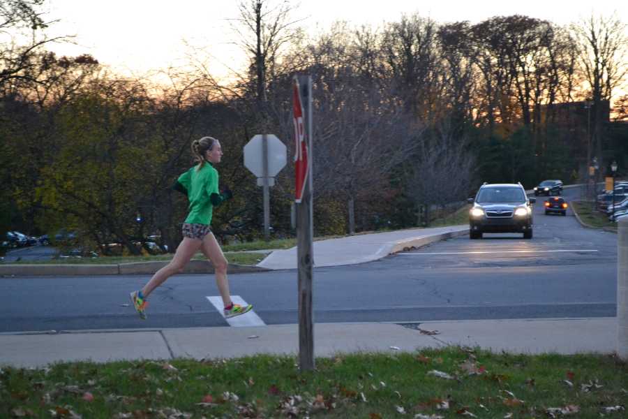 Emma Doughman, a junior, exercise sceience major, trains all year round for upcoming  events by running around campus.