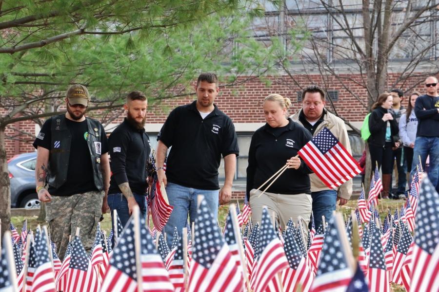 Marywood+student+veterans+were+asked+to+place+flags+in+Tree+Stadium+at+the+ceremony.