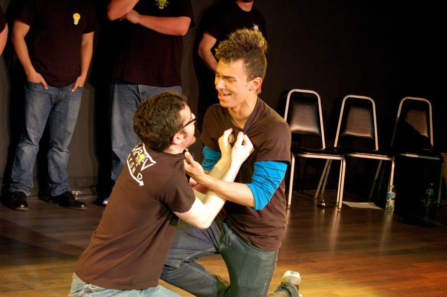 Paul Capoccia and Terry Thompson perform in Improv Beyond's Spring Show. 