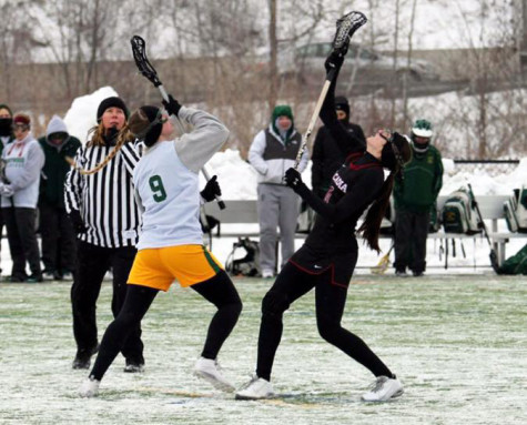 Tiffany Brznek facing an opponent during a home game against Arcadia University in 16-7 loss.