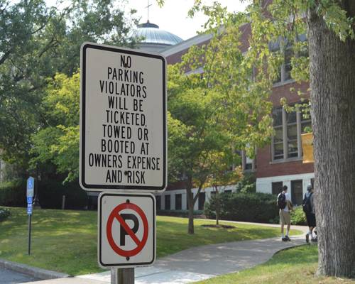 New signs posted in each designated lot for the 2015-16 academic year. 