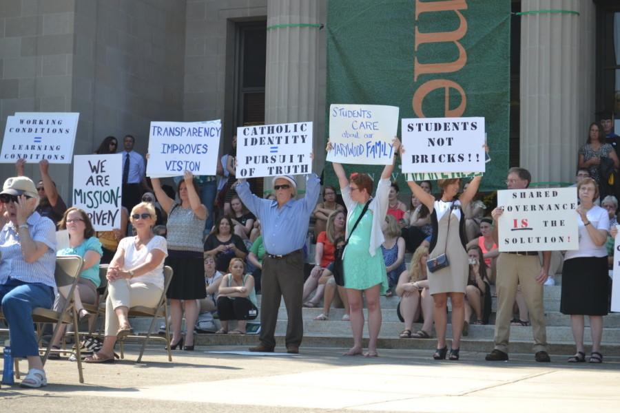 During the dedication of the Learning Commons, several members of faculty, as well as students, staged a silent protest on the steps of Liberal Arts Center. 