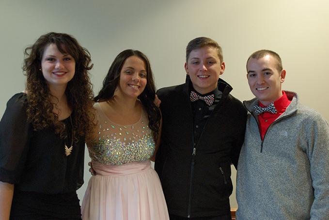Kelly Layton, Roni Shoemaker, Derrick Eyerman, and Eric Schnell get ready to go to Marywoods Homecoming. 