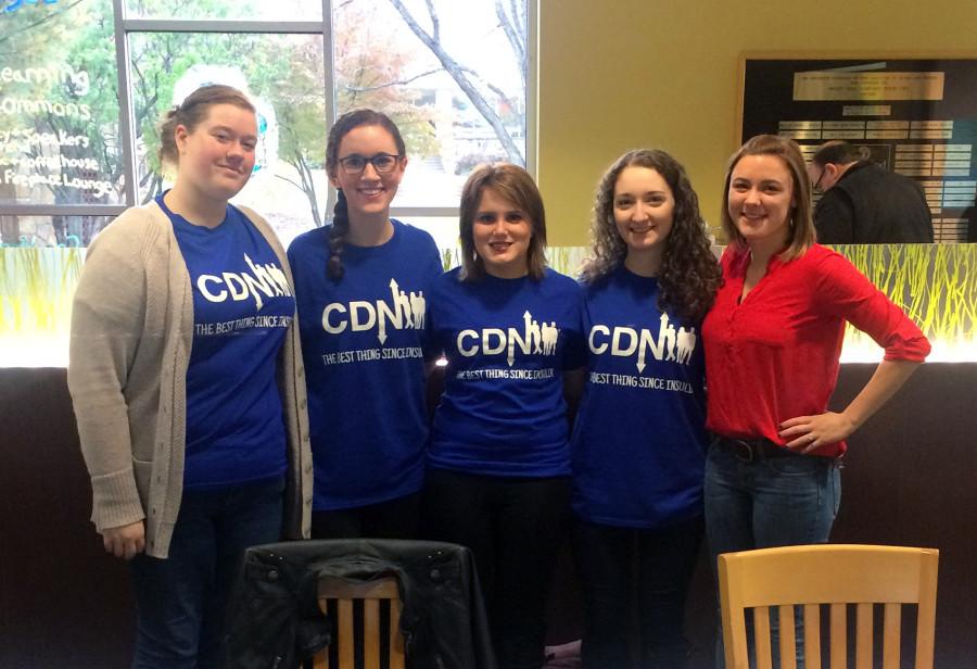 Members of the Marywood chapter of the College Diabetes Network stand by their club's table at the Oct. 24 Open House. 