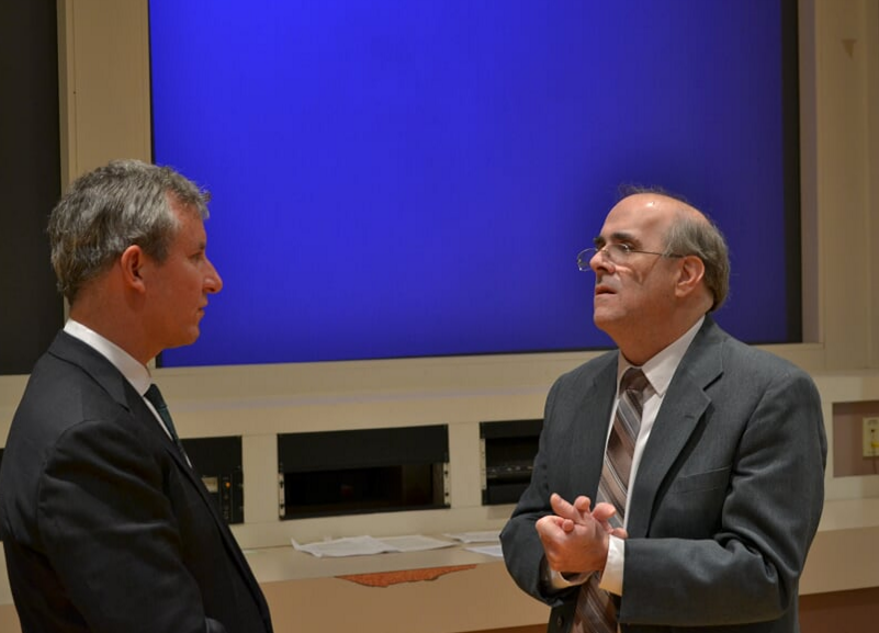 Congressman Cartwright (left) speaks with Professor Dr. Ertl. 