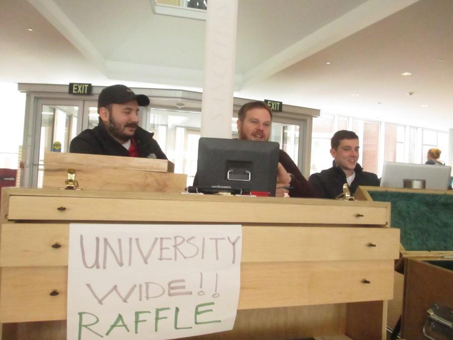 Architecture students Nico Granci, Rob Miller, and Phillip Blevins are auctioning their boxes.