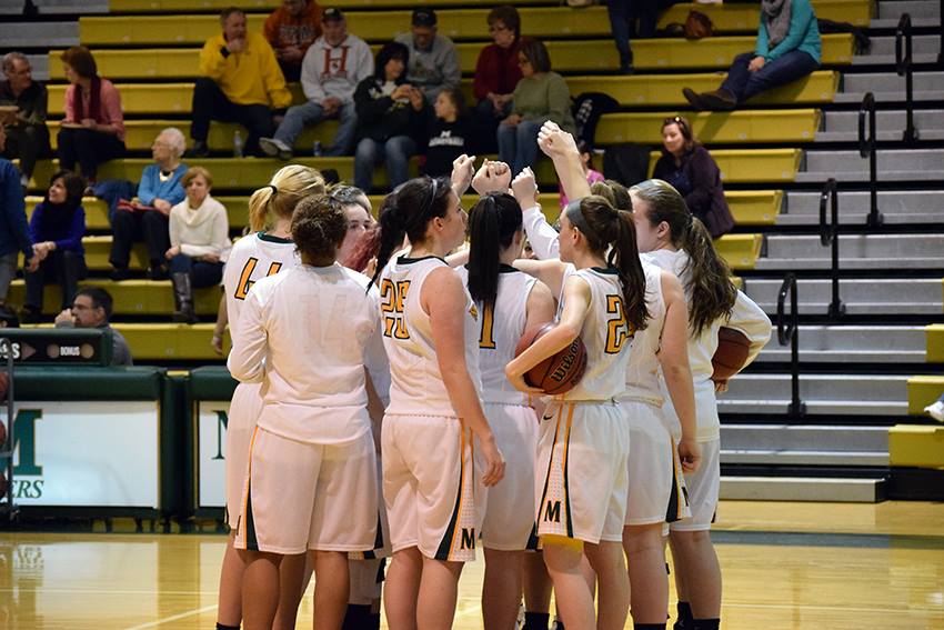 The women's basketball team huddles during their Jan. 30 home game against the Centenary College Cyclones.