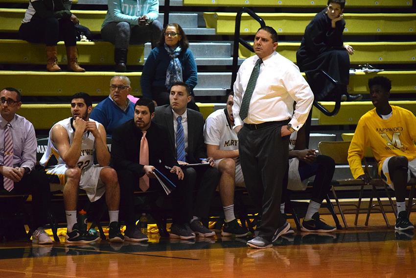  Coach Enrico Mastroianni watches his team during their game against Keystone College on Jan. 27.