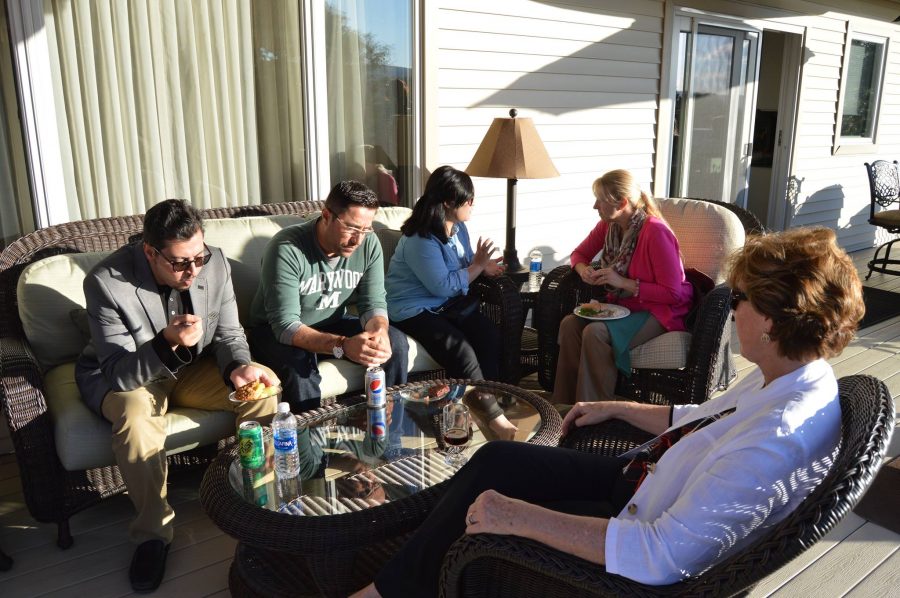 Student leaders and some administration eating dinner on Sr. Marys deck.