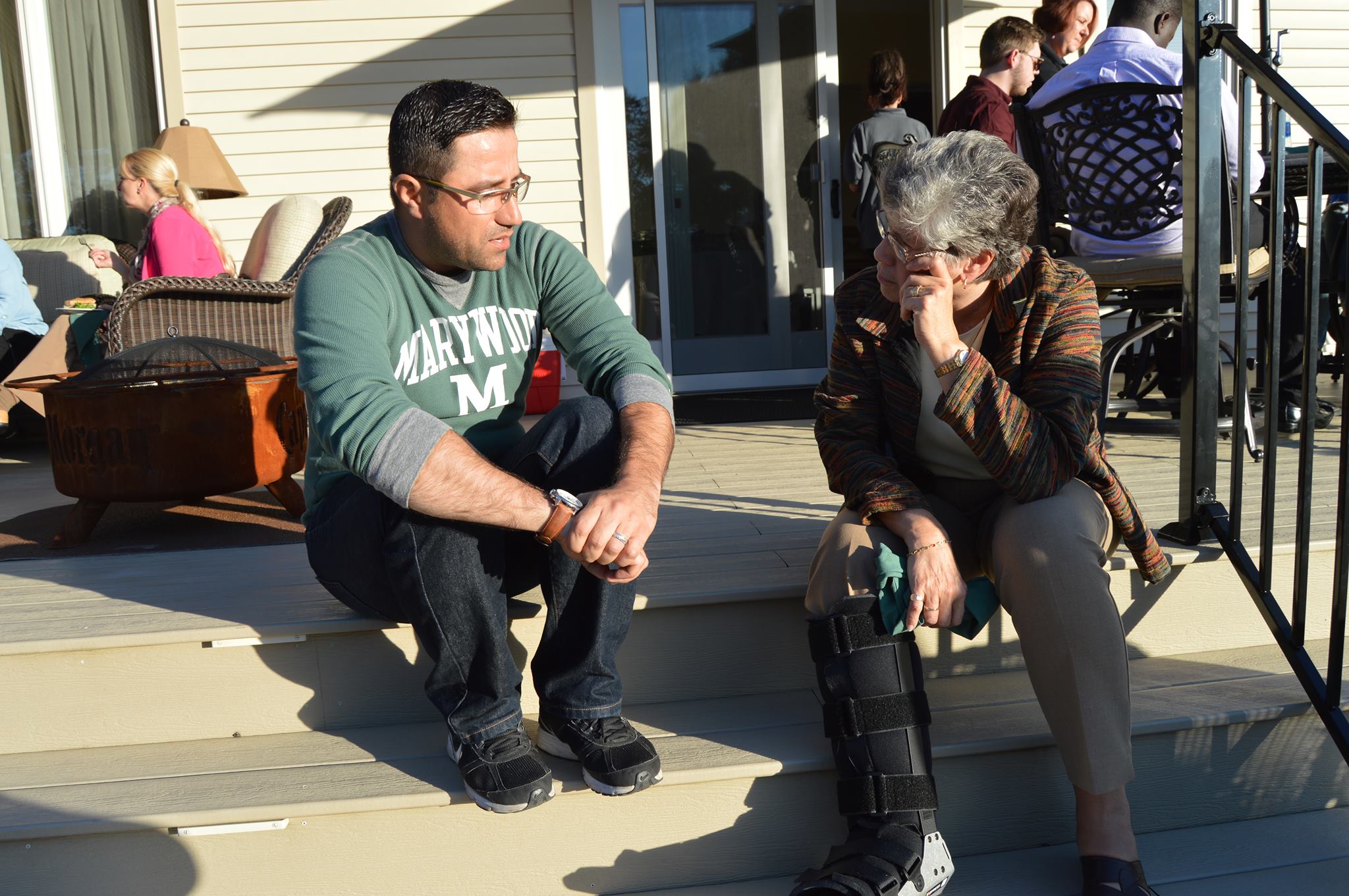 Sr. Mary talks to graduate student Bashir Mahmood.