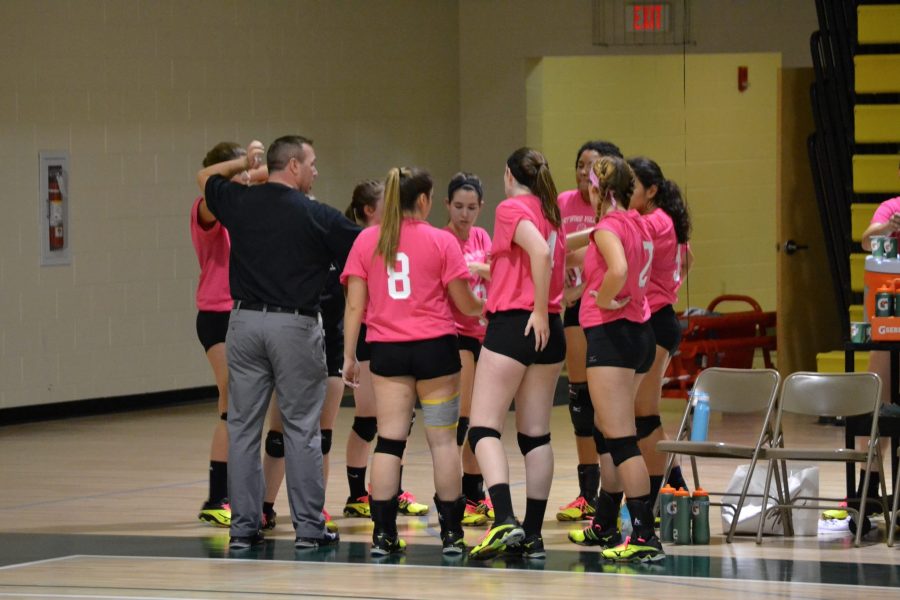 The volleyball team gets set for its Dig Pink tri-match.