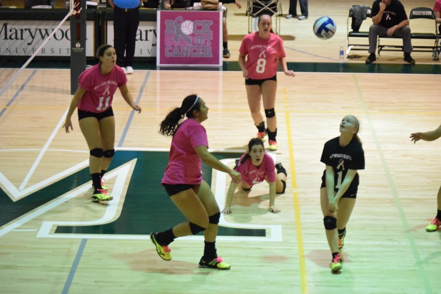 Freshman Jordan Vossler gets ready to save the point for her team.