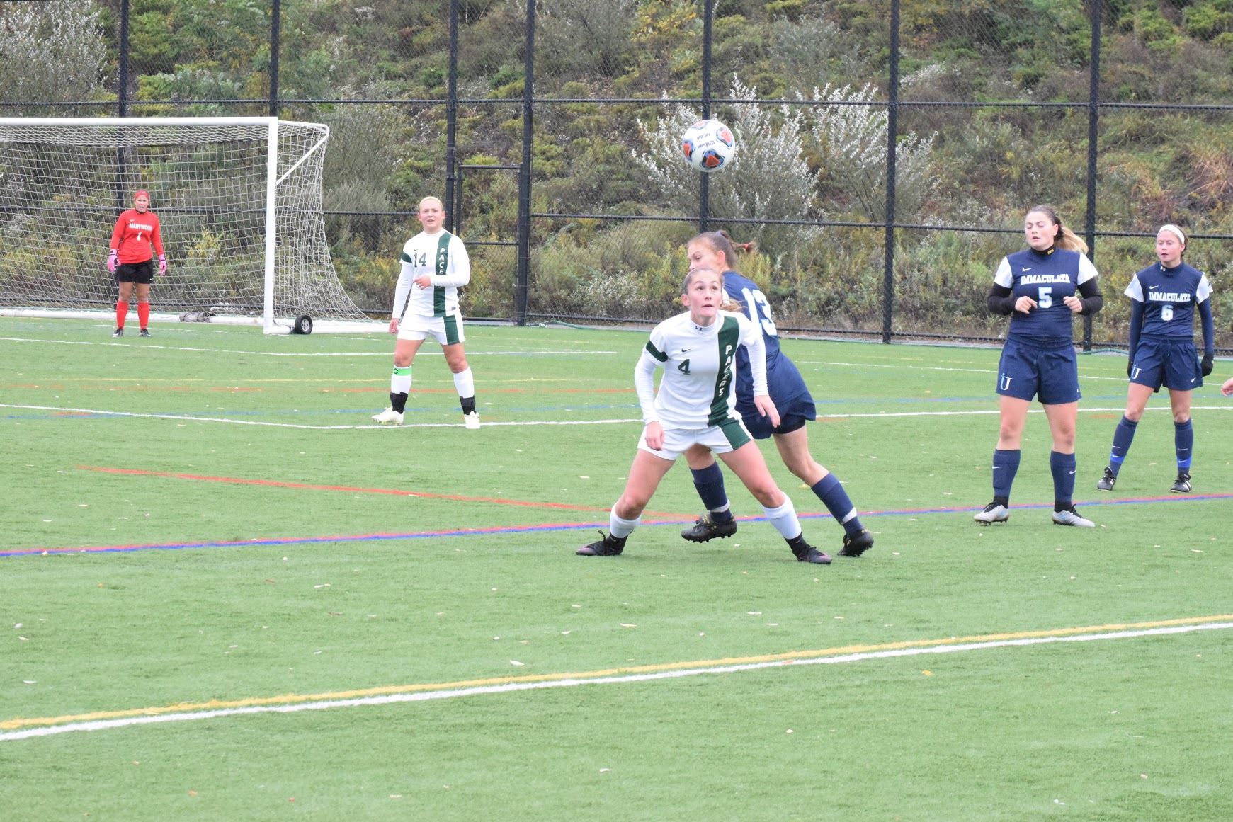 Sophomore Julie Youngman plays in a conference game with the Mighty Macs