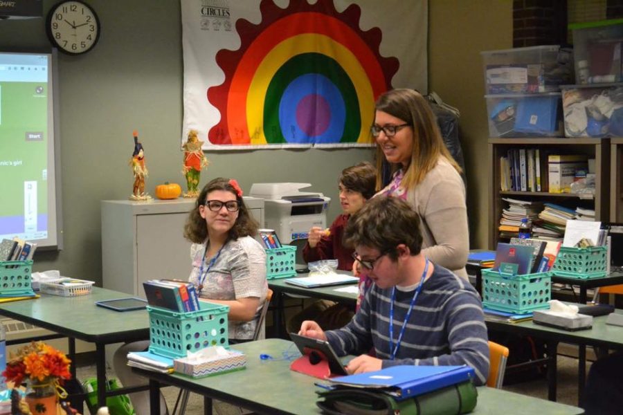 Students enrolled in the SOAR program play an interactive game during their morning class.