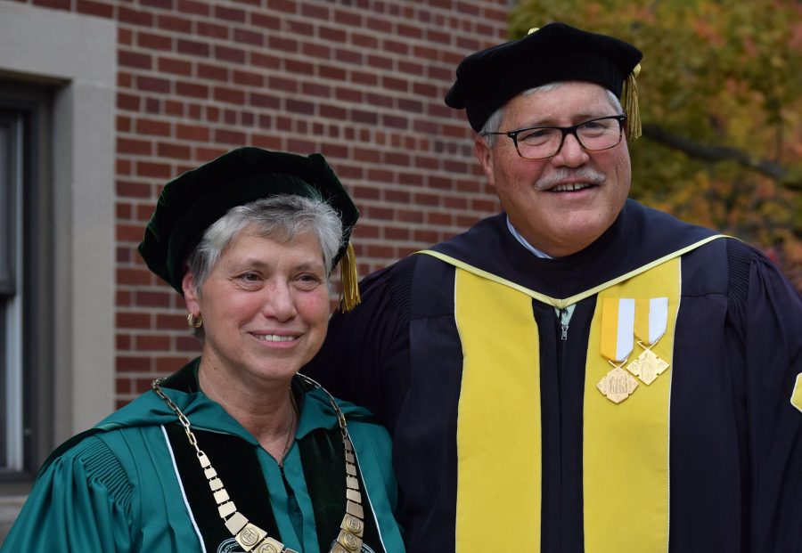 Brother and sister Sr. Mary and Frank G. Persico smile for a picture.