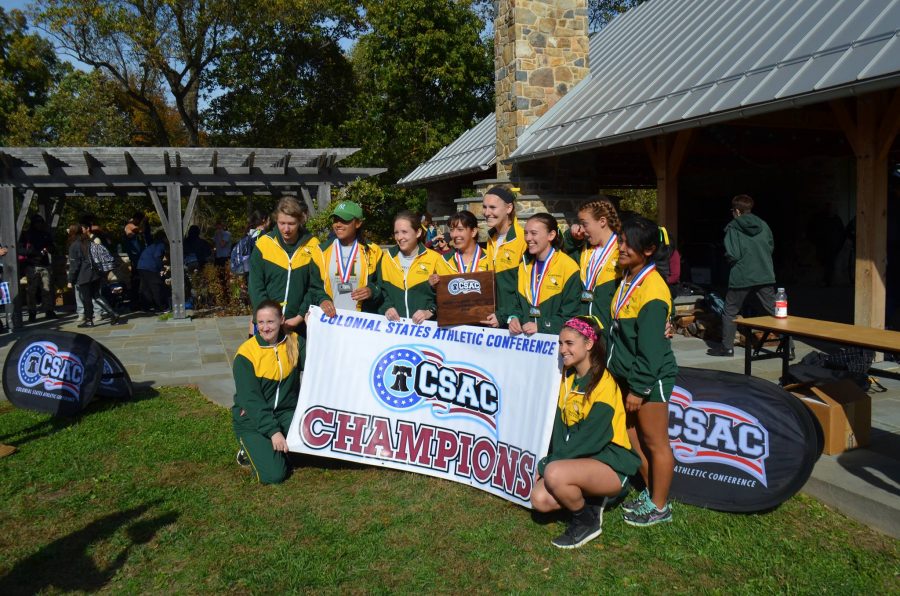 Womens cross country team celebrates its sixth conference championship in seven years. Courtesy of Marywood Athletics