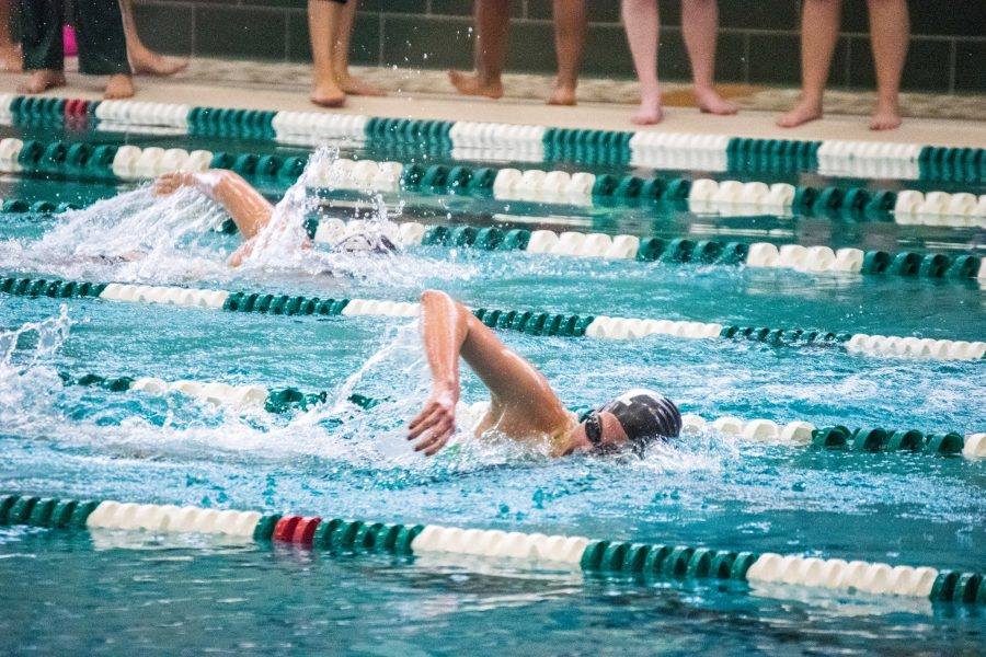 Marywood men swimmers battle with the University of Scranton