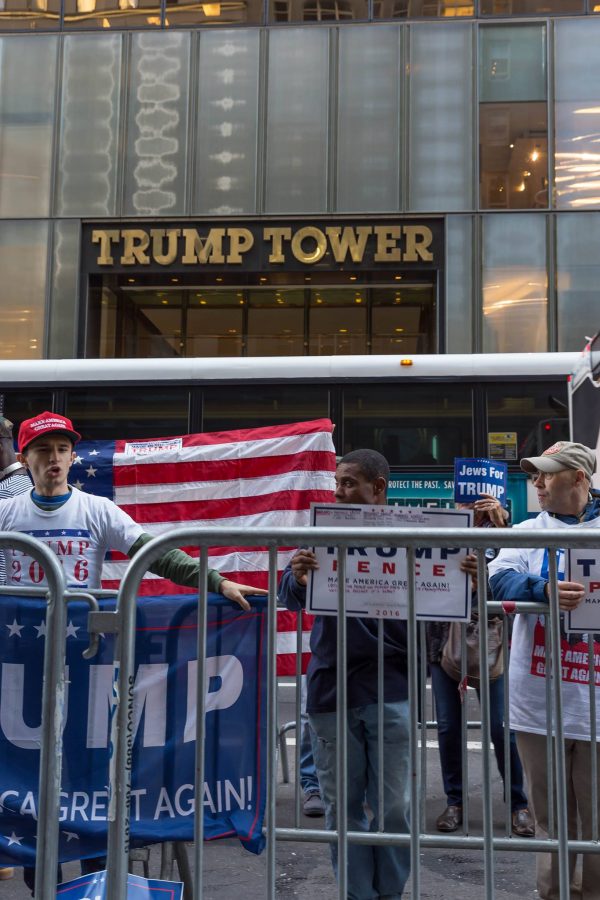 By Marco Verch (Trump supporters in front of Trump Tower) [CC BY 2.0], via Wikimedia Commons via Wikimedia Commons  