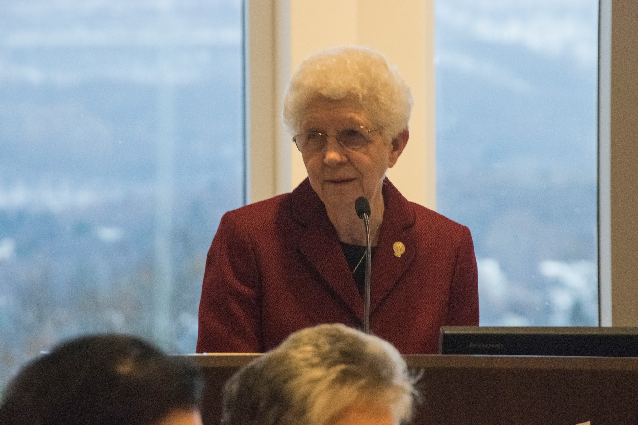 Sister Catherine Luxner welcomes guest with a speech about services and an update on the Thanksgiving Adopt-a-Family drive.