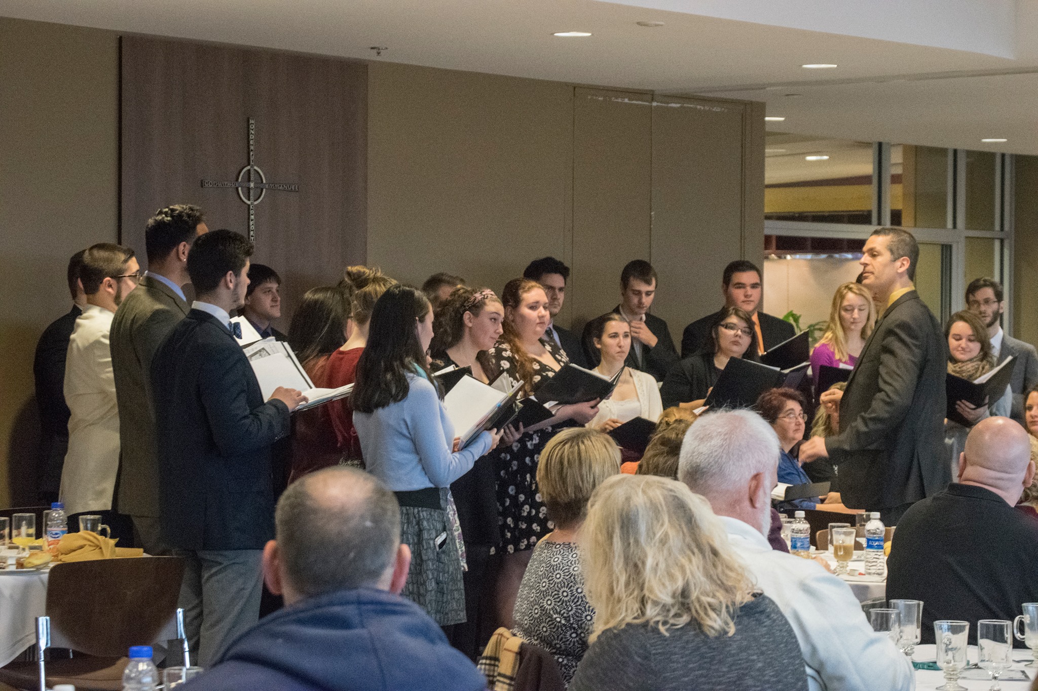 The Marywood Chamber Singers performed a short collection of songs to the people present at the breakfast.