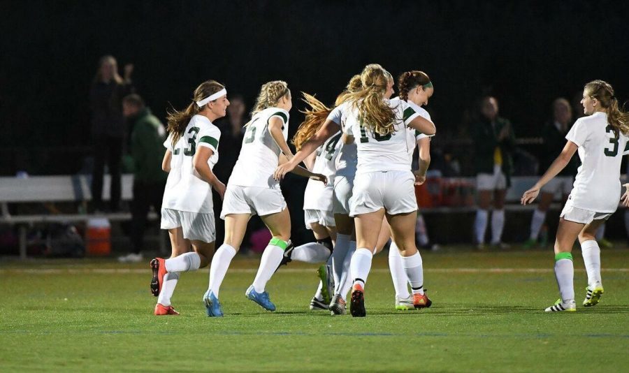 Women's soccer team celebrates goal in semifinal game. Photo courtesy of Marywood Athletics