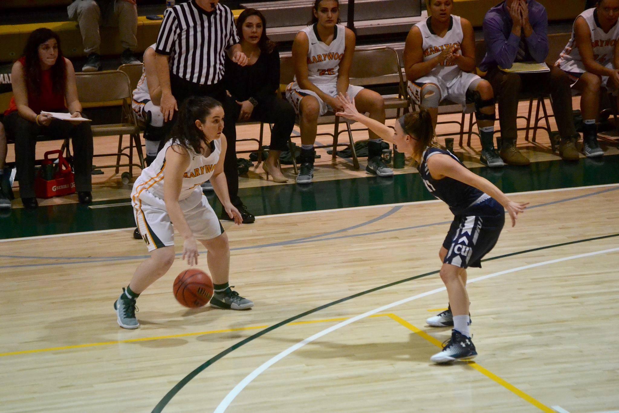 Marywood junior guard Lisa Steakin looks for an open shot in a 63-66 home opener loss to Centenary University.