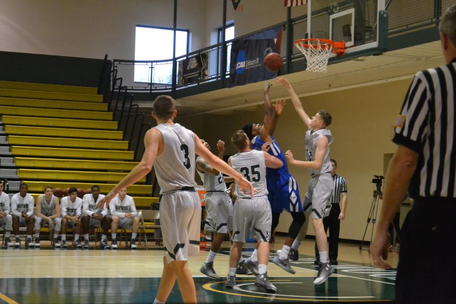 Marywood's Jeremy Ringland battles Cabrini's Tyheim Monroe in the Pacers 12 point loss