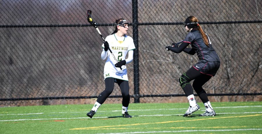 Junior attacker Erin Healy looks to make a play against Arcadia University. Photo courtesy of Marywood Athletics. 