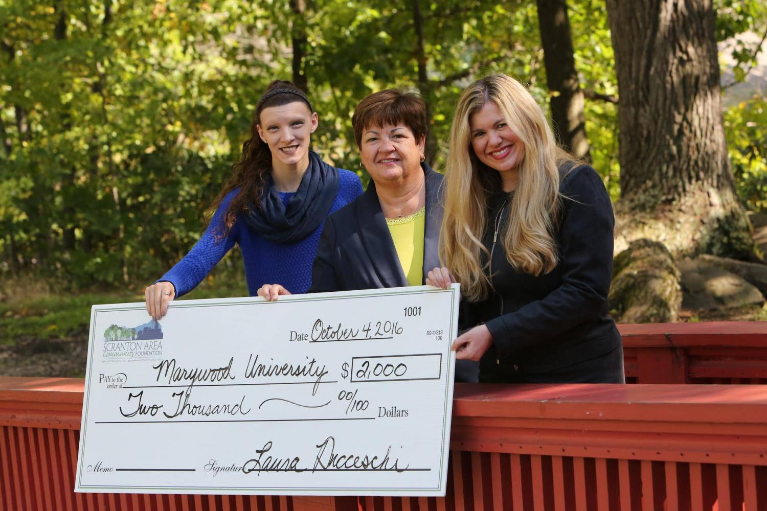 (Pictured left to right) Marissa Draim, Clarks Summit, violin music education major and student teacher for Marywood University’s String Project; Cathy Fitzpatrick, grants administrator at The Scranton Area Foundation; and Laura Ducceschi, president and CEO at The Scranton Area Foundation.