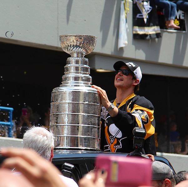 Sidney Crosby continues moving up the all-time list with Stanley Cup victory. By daveynin from United States (Sidney Crosby and his cup) [CC BY 2.0],
W3C via Wikimedia Commons