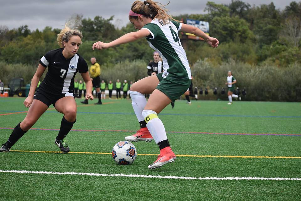 Junior midfielder/forward Julie Youngman attempts to navigate the Cavalier defense.