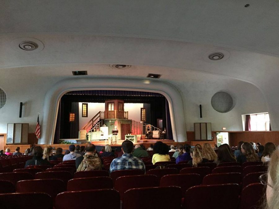 Sr. Mary speaks to a crowd in the Performing Arts Center.