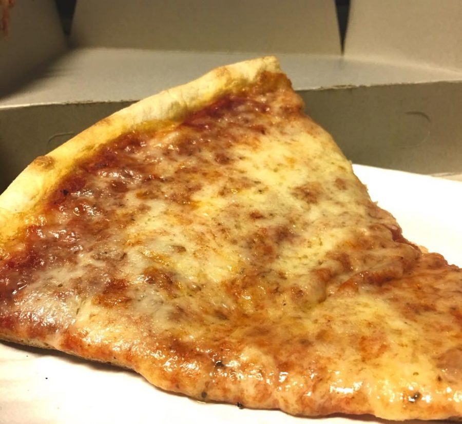 A slice of New York style pizza. 