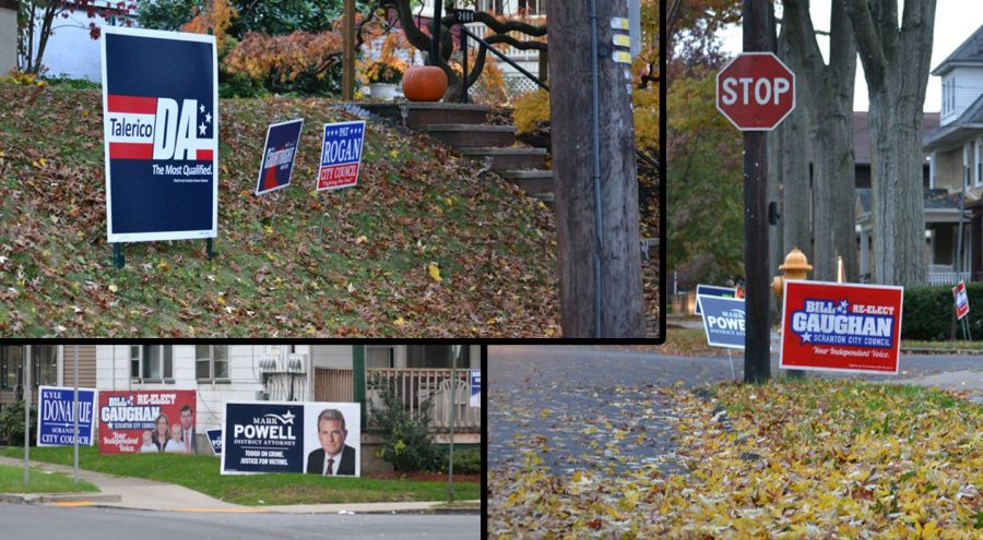 Scranton residents show their support for local candidates with yard signs.