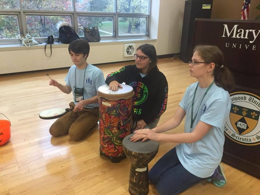 SOAR students enjoy drums via Marywood's Music Therapy Club. Facebook photo used with permission from the Marywood SOAR Program.