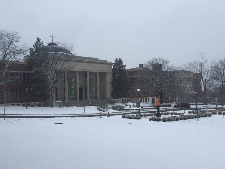 Snow falls outside the Liberal Arts Center the day before classes start for the spring 2018 semester.