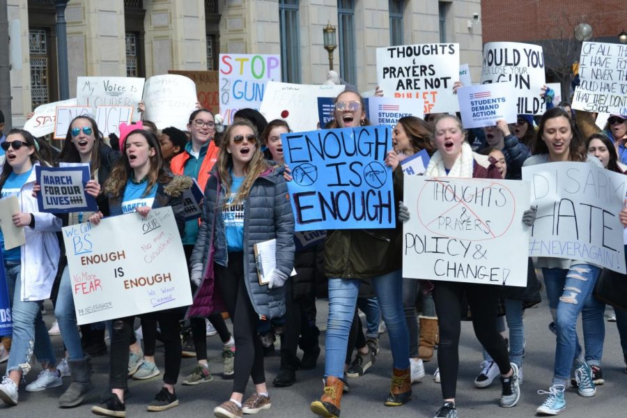 Students lead the crowd through the streets of Scranton on Saturday, March 24. 