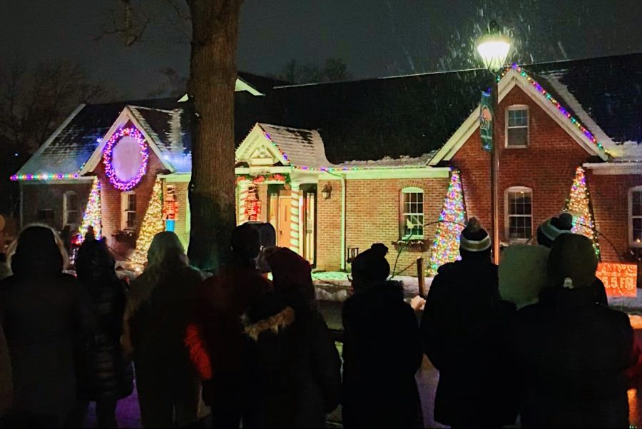 Students gathered outside of the Printing and Mailing Center to watch Marywood's first ever light show on Dec. 4. Photo credit: Katie Warnokowski