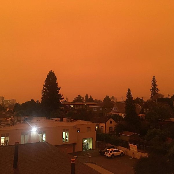 The smoke from a wildfire in early Sept. 2020 paints the sky over Oakland, California. Photo via Wikimedia Commons under Creative Commons license, Courtesy of J. Healey