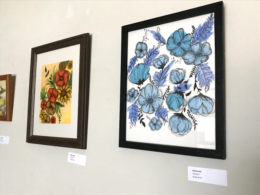 Hanging in the Suracci Gallery are Senior Art Therapy Major Claire Little Florals 1 and Florals 3. Little said she is most proud of these pieces due to the time and effort it took to create these pieces of art.