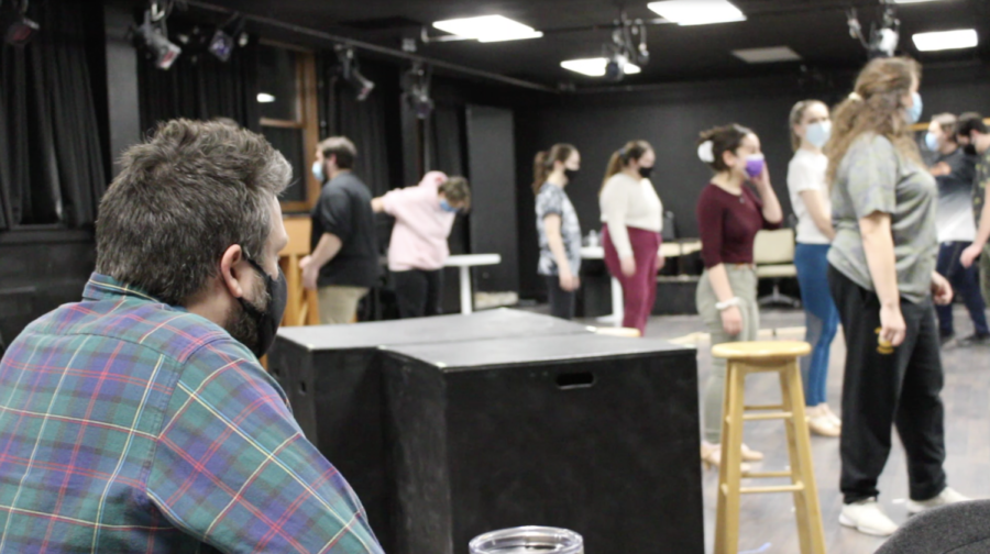 Dr Pyles overlooks rehearsal of "Merrily We Roll Along".