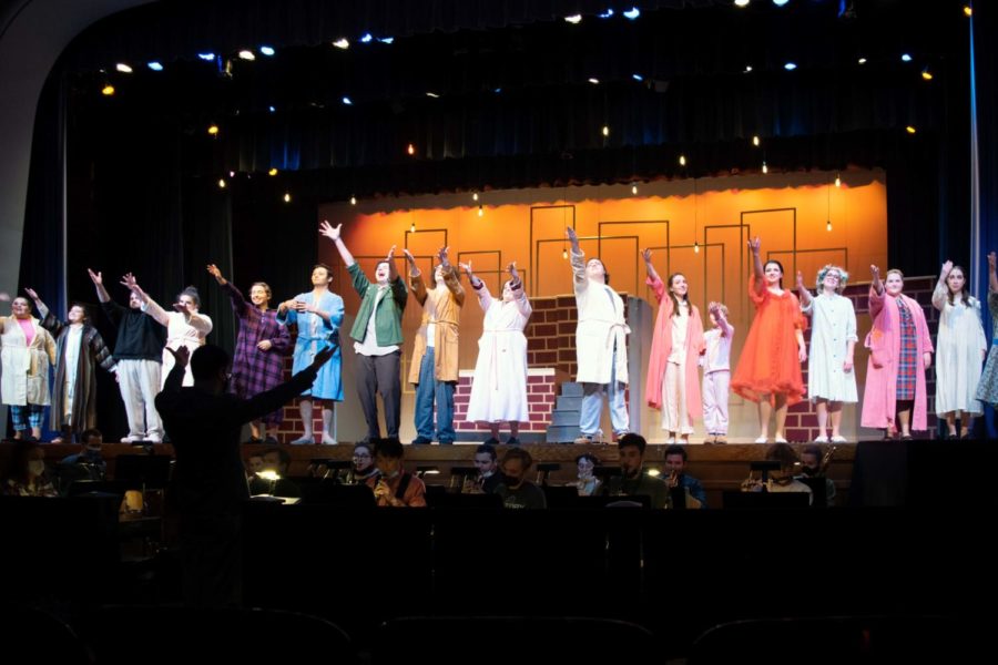 The cast of Merrily We Roll Along takes their bows following the final song of the show, Our Time.