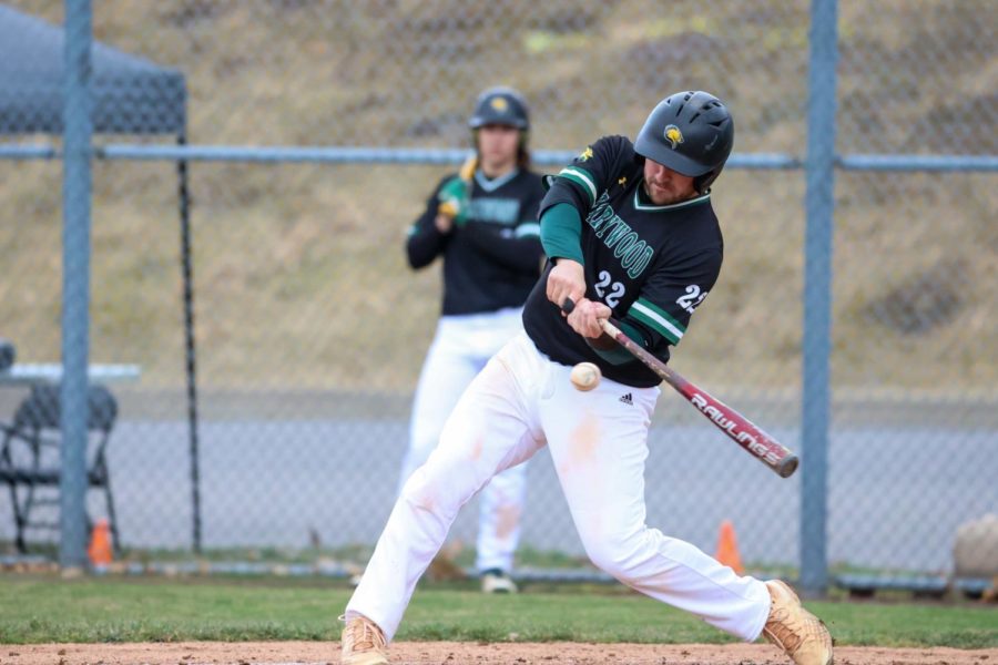 Jake Shuster (seen here) was the star player against John Jay: 1-for-3 with 2 RBIs in game one and 2-for-3 with 2 HRs in game two.