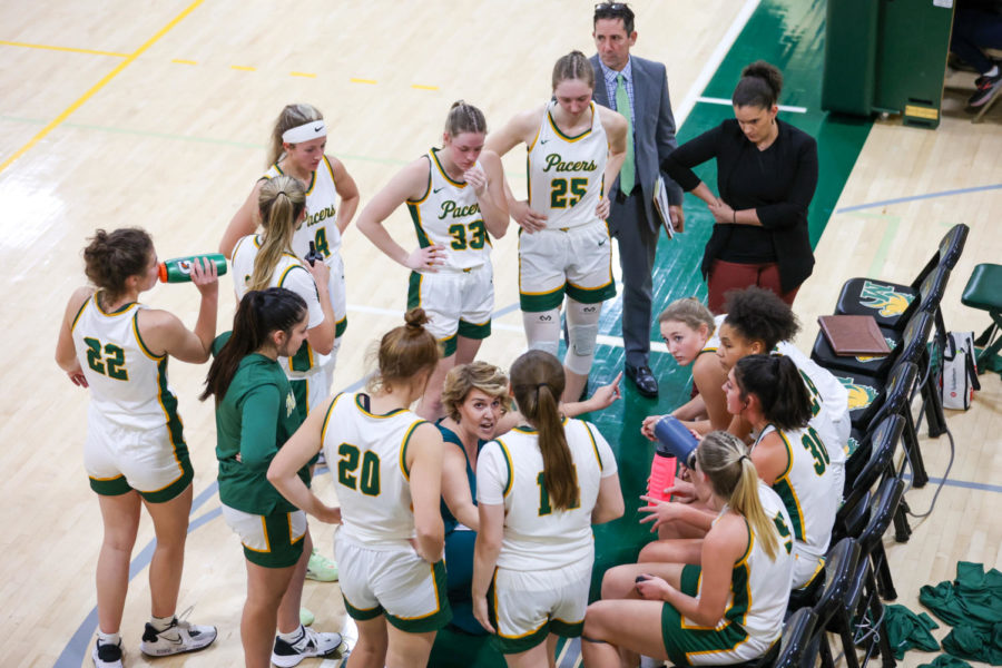 Coach Jennifer Carleton gives the Pacers some words of wisdom during a timeout.