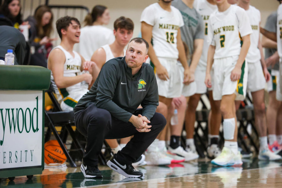 Coach Jon Showers watches the clock tick down.