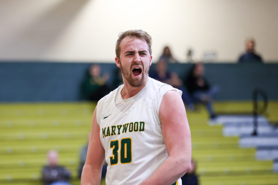 Senior forward Jason Holman is fired up after a huge basket for the Pacers.