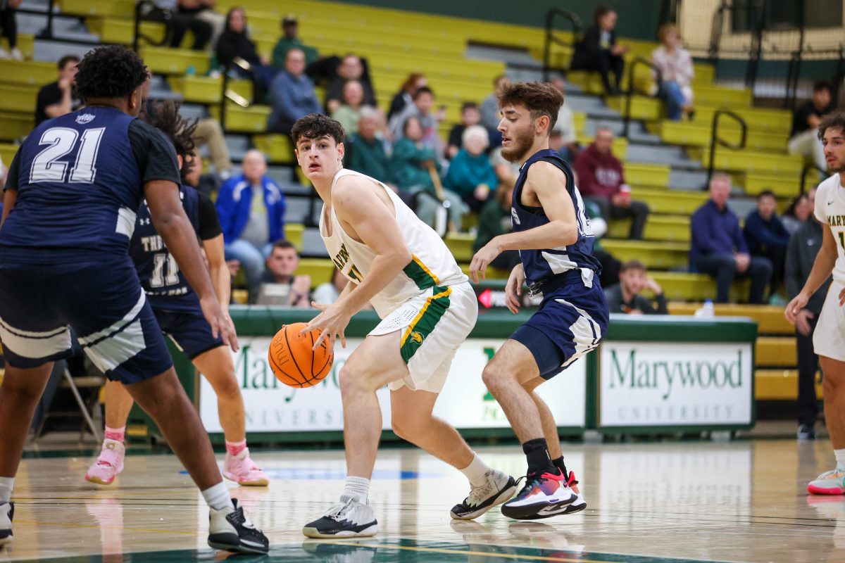 Lucas Altmire drives through the lane.